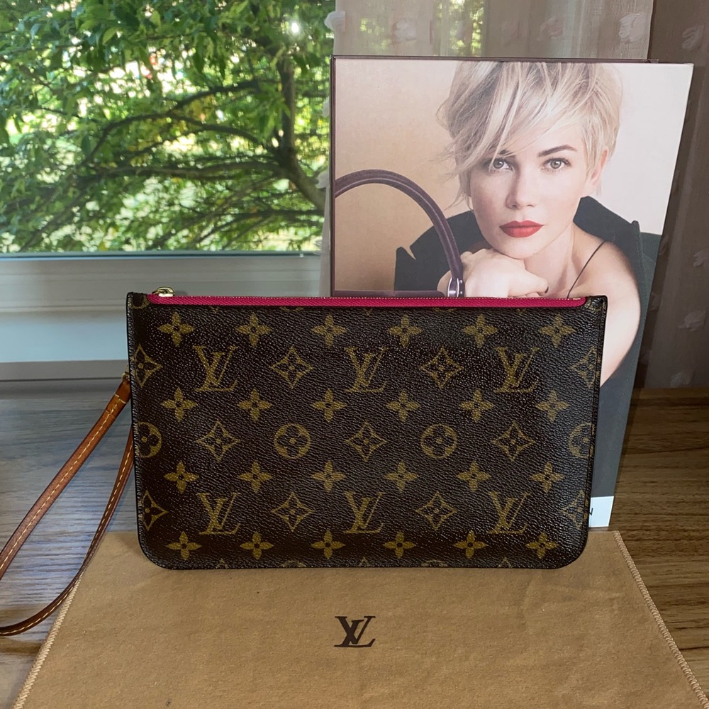 Sold- Louis Vuitton pouch